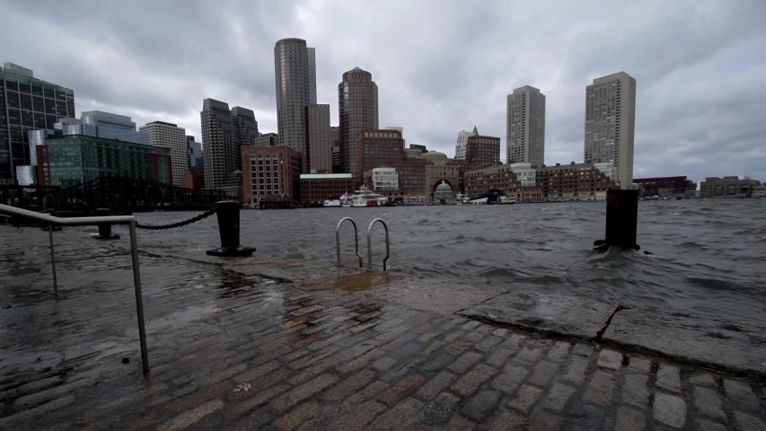 Winds and waves crash along Boston's waterfront during a strong winter storm