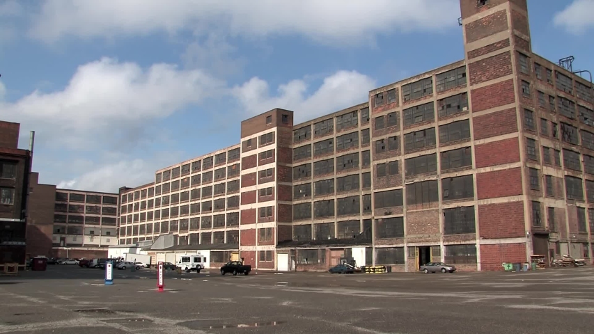 Pan shot of old warehouse in Detroit, Michigan, USA.