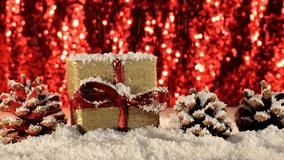 beautiful Christmas video with twigs of spruce, Christmas toys on the background of falling snow