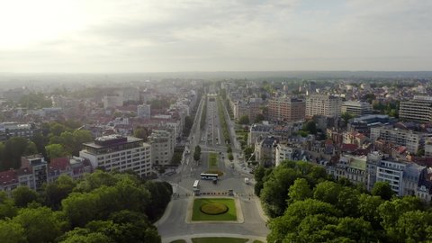 Brussels, Belgium. Park of the Fiftieth Anniversary. Park Senkantoner. The Arc de Triomphe of Brussels (Brussels Gate), Aerial View, Departure of the camera