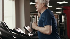 Physical Exercises and Sport Work Out at Gym Room. 50s or 60s Elderly Man Training Healthy Body Close Up. Workout of Old People for Athlete Muscles Inside Fitness Hall. Session of Physical Activity - Powered by Shutterstock - Get 15% off with code: PIKWIZARD15