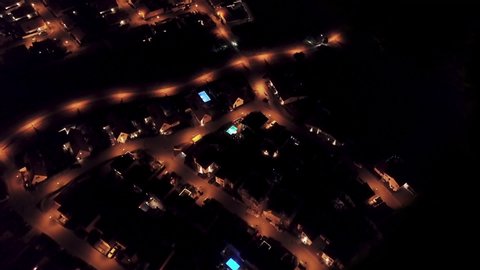 Aerial view of power outage blackout in suburban neighborhood.

Relevant to coronavirus, covid-19, sars-cov-2 corona virus viral outbreak.