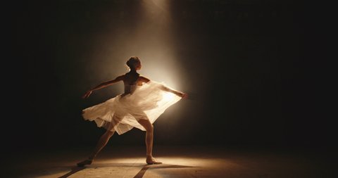 Cool female ballet dancer showing an artpiece on stage, doing different moves - arts, way to success concept 4k footage