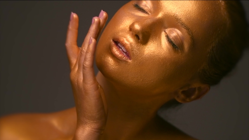 fashion art golden skin woman face Stock Footage Video (100% Royalty ...