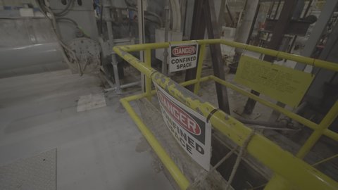 Footage of a confined space access point in an industrial building.  Shot in Log format.