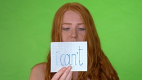 Girl changes I'cant sign to I can, concept can do attitude. Studio shot - Powered by Shutterstock - Get 15% off with code: PIKWIZARD15