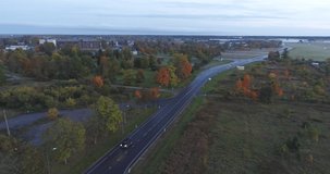 Aerial footage of Autumn season in  small Estonian town. Autumn aerial of scenic sunset.