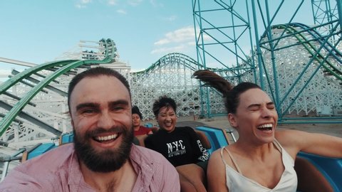 Los Angeles, California/USA - 08.24.2019: Roller coasters at Six Flags in California, selfie video of riders, lots of fun and adrenalin, extreme riding, laughing and screaming of excitement