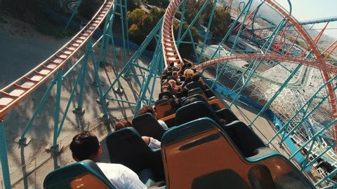 Los Angeles, California/USA - 08.24.2019: Roller coasters at Six Flags in California, first person view, lots of fun and adrenalin, extreme riding, laughing and screaming of excitement