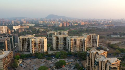 Aerial: Contrasts neighborhoods in city - Mumbai, India