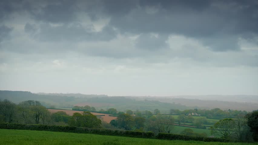 Huge Clouds Over Rural Landscape Timelapse