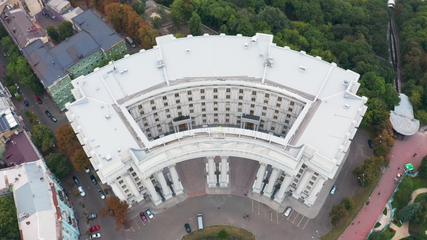 Building of the Ministry of Foreign Affairs of Ukraine with a waving flag on top. Top view. Overall plan 4k