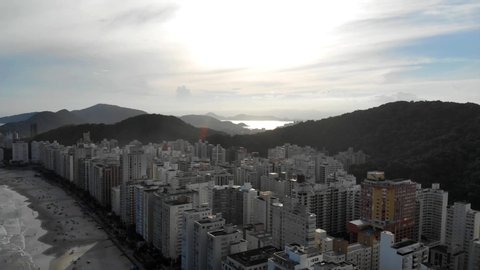 Skyscrapers And Big Hills With Beautiful Sky In Guaraju - Moving Right To Left