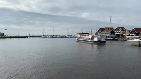 Volendam,Netherlands-October 7,2019: In the Volendam harbor. Volendam is a town in North Holland, 20 kilometres north of Amsterdam. Sometimes called The pearl of the Zuiderzee.