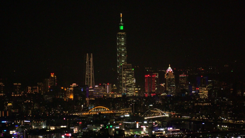 TAIPEI, TAIWAN - CIRCA AUGUST 2019 : Aerial view of cityscape of Taipei at night. View around shopping and business district at Xinyi area.