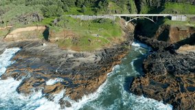 At high tide, it looks like the Pacific Ocean is draining into a circular hole in the middle of Cape Perpetua, just south of Yachats, Oregon. This is Thor's Well