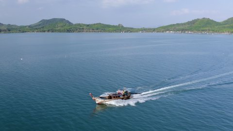 Close up shot of motor boat by the sea shore on tropical island, Thailand