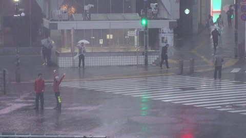 TOKYO,JAPAN - 12 OCTOBER 2019 : Powerful Typhoon Hagibis made landfall. Heaviest rain and winds in 60 years. Government issued highest level of disaster warning. View around Shibuya scramble crossing.