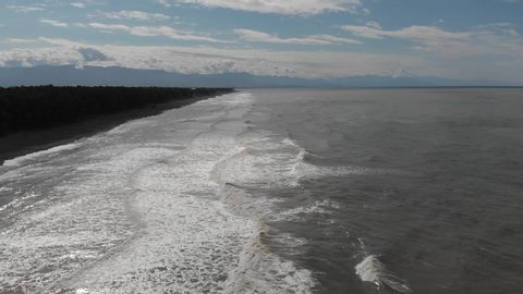 Drone flying over of big waves in Shekvetili sand beach. Georgia