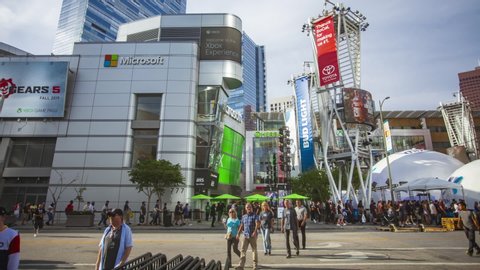 Los Angeles, CA / USA - 10/1/2019 Time-lapse of L.A. Live Microsoft expo or conference in downtown Los Angeles in California with people and tall buildings 