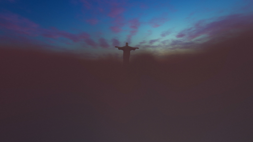 Jesus Christ above clouds at sunset, 4K