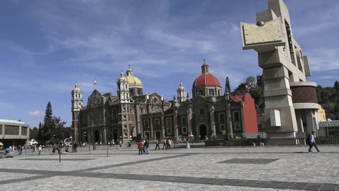 Mexico, Mexico city- 09 October 2019: tracking shot square of the Basilica of Madonna of Guadalupe, people in the square, old and new Basilica