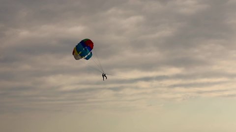 The skydivers enjoys the cloudy skies of late summer.