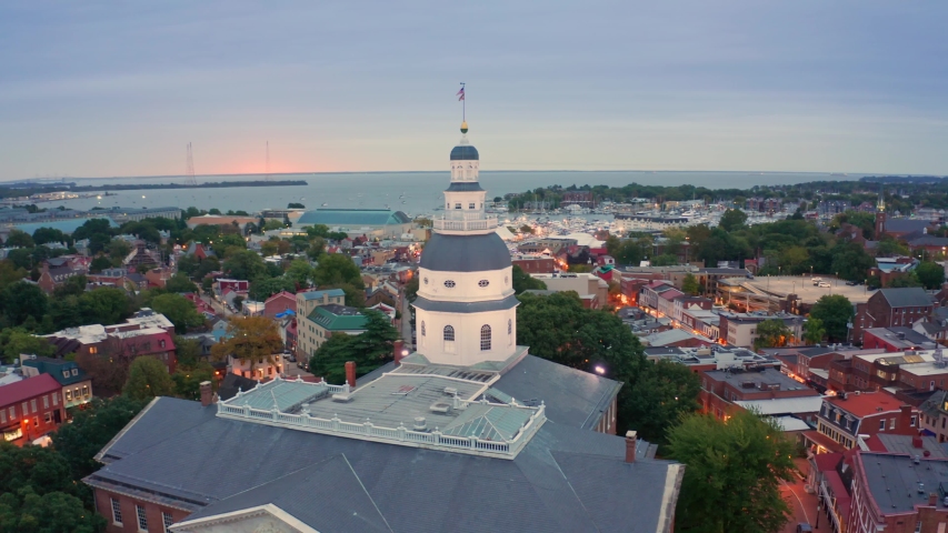 Aerial drone footage of Annapolis at dawn. Annapolis is the capital of the US state of Maryland and the county seat of Anne Arundel County. The drone rotates around the Maryland state house.