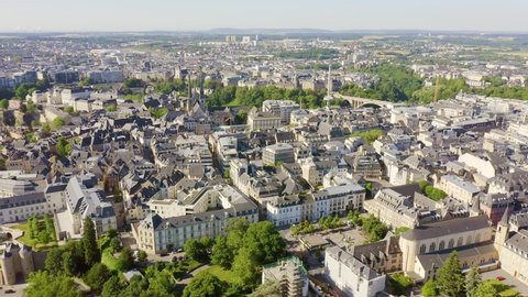 Luxembourg, Historical city center in the morning. Pont Rouge, Aerial View, Departure of the camera