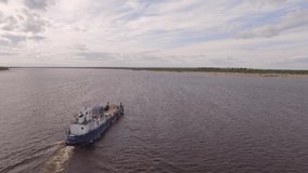 Ferry on the river. Morning. 4K aerial video