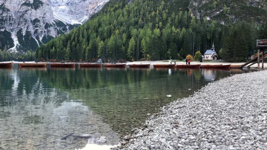 Time lapse of Pragser Wildsee or Braies Lake at autumn in afternoon, located in the Prags valley in South Tyrol,  Dolomites, Italy
