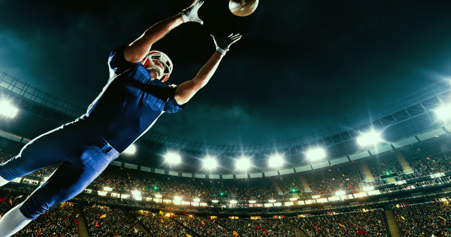 American football player jumps with a ball on a professional sports arena with bleaches full of people. Arena and people on it are made in 3D. | Shutterstock HD Video #1039098326
