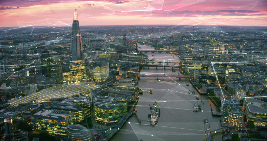 Aerial view of London Skyline with connections. Technology-Futuristic. High tech view of the financial district connected through a network. Internet of Things. Artificial intelligence. Royalty-Free Stock Footage #1039110317