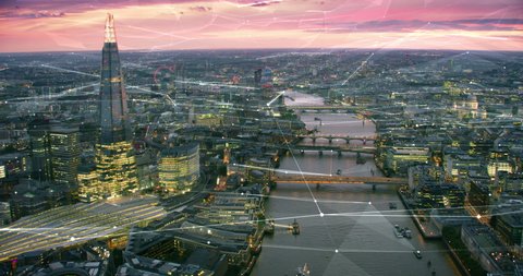 Aerial view of London Skyline with connections. Technology-Futuristic. High tech view of the financial district connected through a network. Internet of Things. Artificial intelligence.