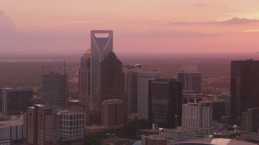 Charlotte, North Carolina circa-2019. Aerial view of Charlotte at sunset. Shot from helicopter with Cineflex gimbal and RED 8K camera.