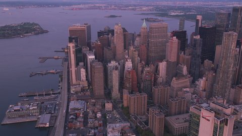 New York City, New York circa-2019. Aerial view of Manhattan at sunrise. Shot from helicopter with Cineflex gimbal and RED 8K camera.