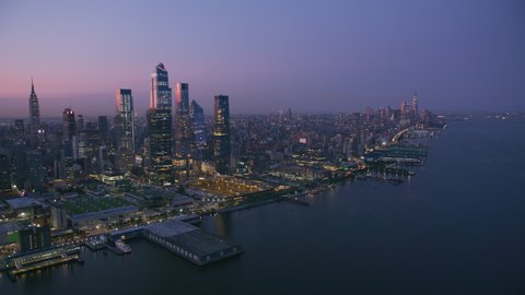 New York City, New York circa-2019. Aerial view of New York City at sunrise. Shot from helicopter with Cineflex gimbal and RED 8K camera.