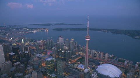 Toronto, Canada circa-2019. Aerial view of Toronto at dusk. Shot from helicopter with Cineflex gimbal and RED 8K camera.