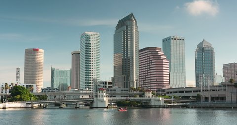 Tampa, Florida - June 14, 2019: 
 Downtown city skyline view of Tampa Florida USA looking over the Hillsborough Bay and the Riverwalk