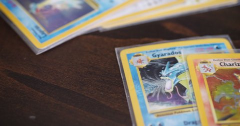 Los Angeles / United States - 09 14 2019: Vintage retro holographic Pokemon card collection with Gyarados and Charizard.