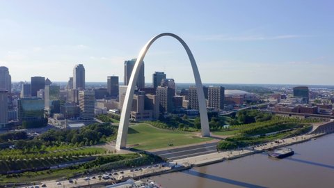 St. Louis, Missouri / USA - August 10, 2019: Sun Reflecting on St Louis Arch, Beautiful Aerial Drone Shot 4K