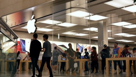 burnaby , British Columbia / Canada - 09 11 2019: Burnaby, BC, Canada - September 11, 2019 : Motion of people playing new iphone inside Apple store with 4k resolution.