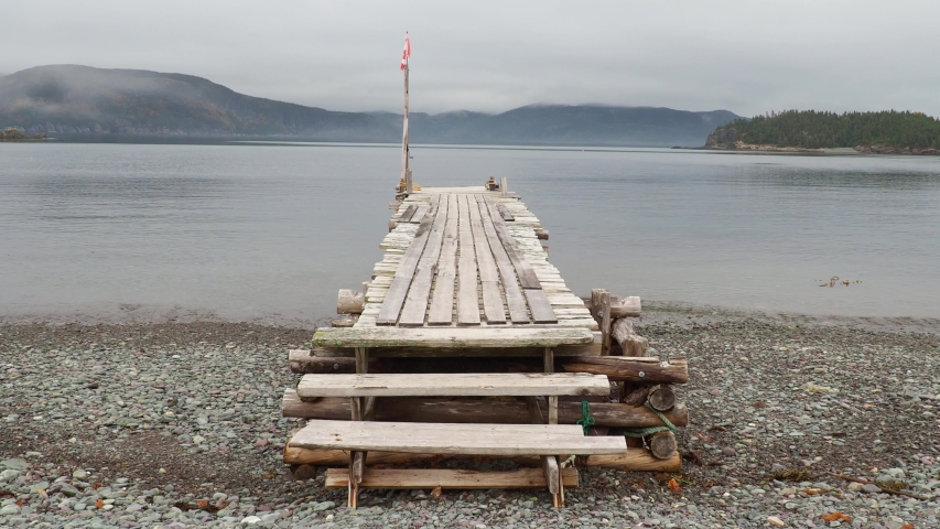 An old fishing wharf at low tide.