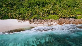 Aerial 4K drone pano footage of tropical sandy beach at Mahe island, Seychelles