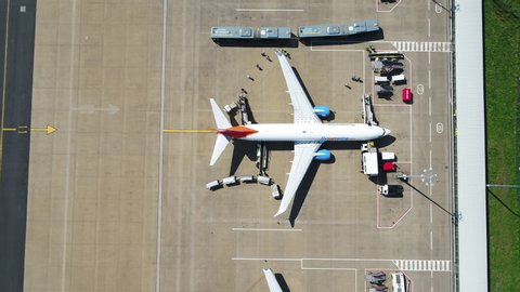 Leeds , Yorkshire / United Kingdom (UK) - 05 15 2018: Aerial view of Airplanes and Aircraft at Leeds Bradford Airport with passengers Disembarking
