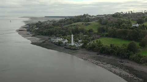 An aerial view of the Tayport West Lighthouse on a cloudy day. Circling right to left from the estuary side of the lighthouse, middle view.