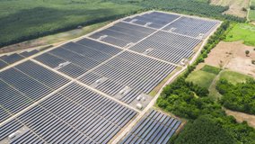 Aerial view of Hyperlapse Time lapse Solar cell farm, Solar power plants have clouds moving through and sunlight shines. footage video 4k.