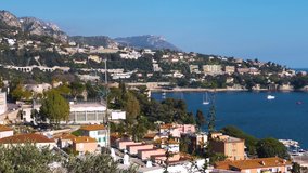 French Riviera. South France. Mediterranean Sea coast. Panorama on resort town houses, streets, harbor. 