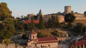 Amazing aerial opening cinematic footage of Belgrade historical fortress Kalemegdan on sunset, Serbia.