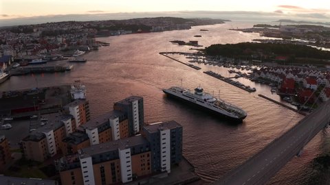 Stavanger, Rogaland / Norway - July 15 2019: Aerial video following the Tau ferry MS Hardanger between Stavanger and Tau in Rogaland, Norway. A goodbye to it, as it is being discontinued from 2020.